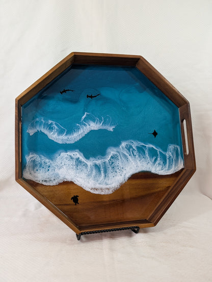 Decorative tray with ocean design and wooden frame on a white background